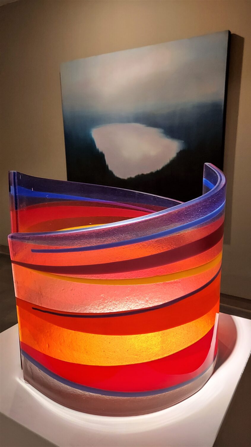 Glass and painting juxtaposed